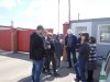 Члены совета, местные жители и руководство завода перед КПП